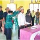 Dalam sebuah upacara yang penuh khidmat, dua perangkat desa baru diangkat dan dilantik untuk memegang posisi krusial dalam pemerintahan Desa Bongganan