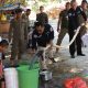 Sambut HUT Humas Polri ke-72, Polres Banggai Bagikan 5.000 Liter Air di Pasar NKRI Bubung