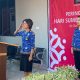 Kepala Seksi Teknologi Informasi dan Komunikasi Keimigrasian, Natalina Marbun, yang menjadi inspektur upacara