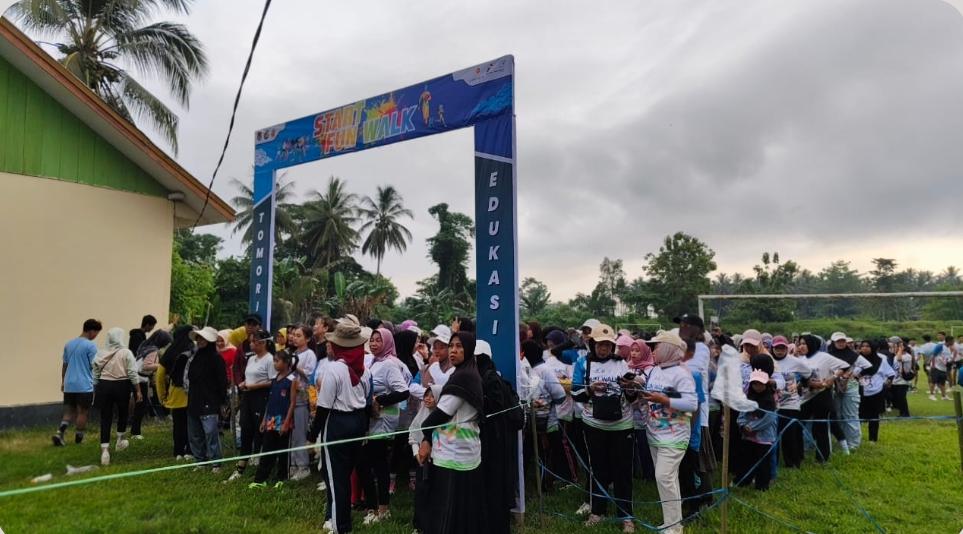 Jalan Sehat “Tomori Sehat 2025” Meriahkan Desa Sinorang