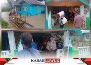 Respon Cepat Polsek Nuhon Bantu Evakuasi Masyarakat Terdampak Banjir